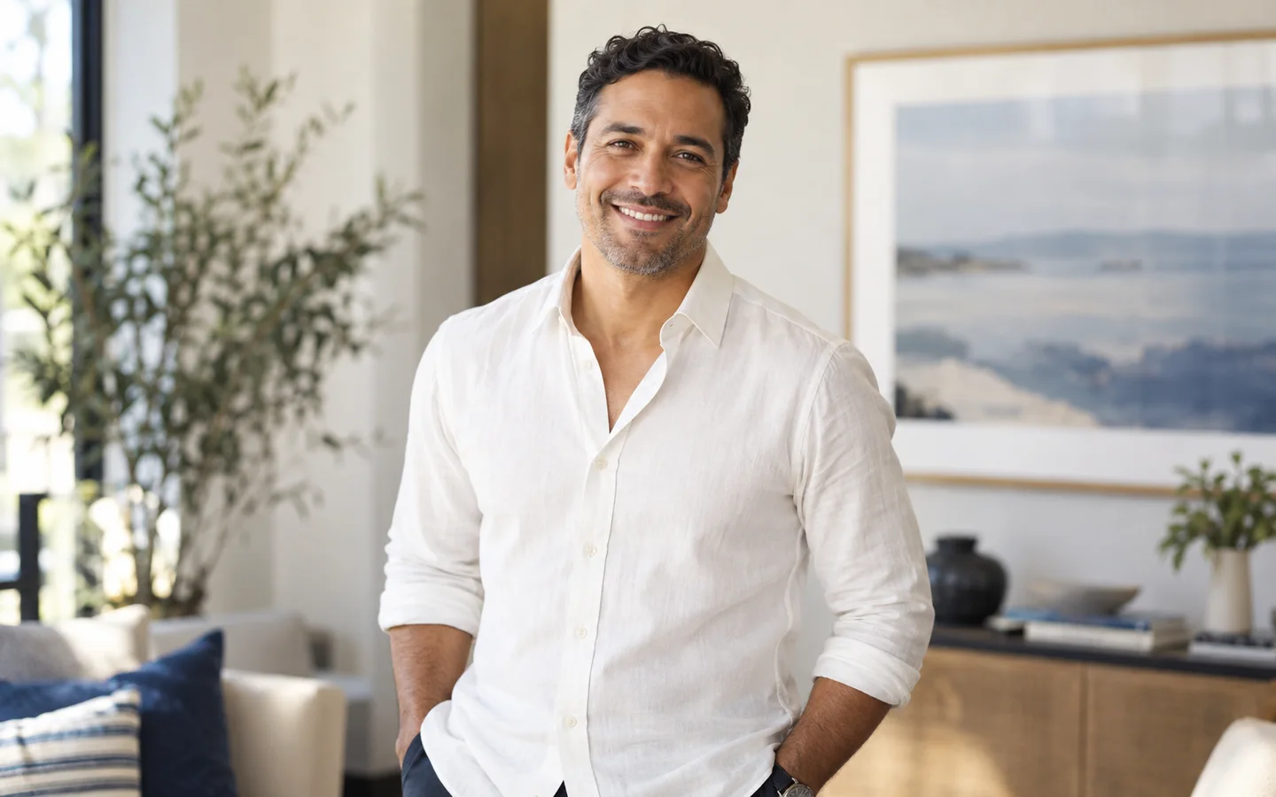 Man smiling in a bright interior
