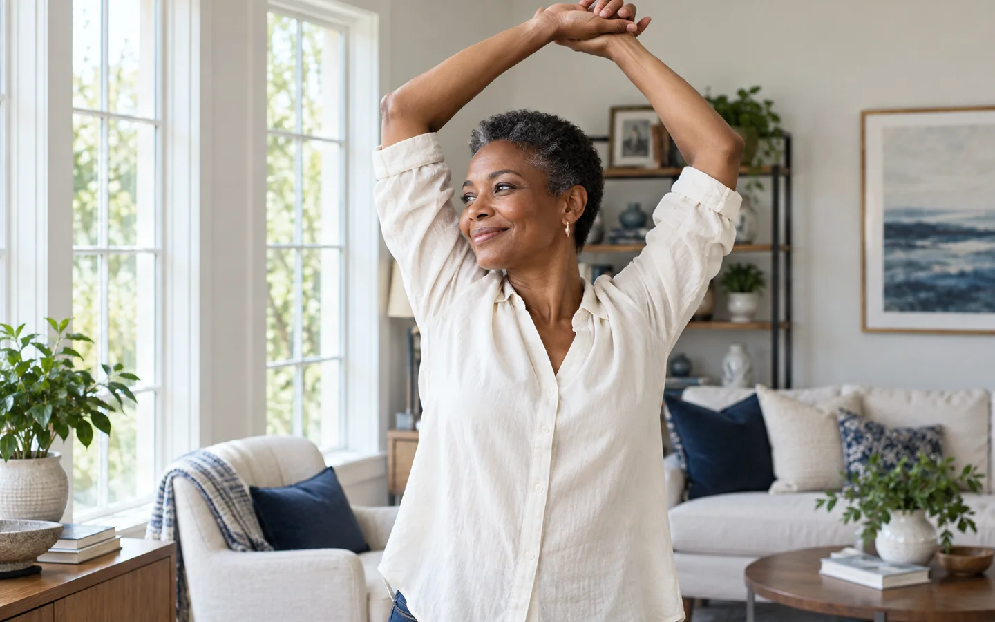 Woman smiling in a bright living room